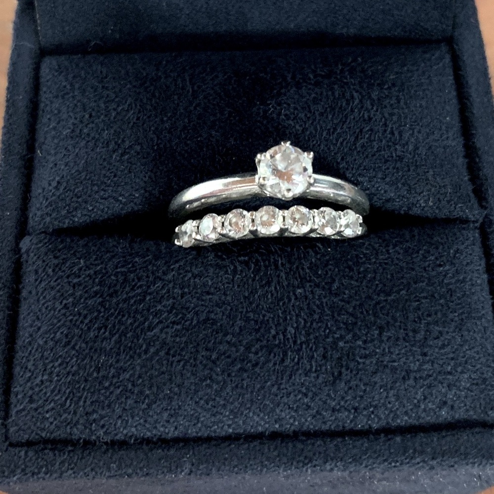 Platinum plated 925 silver and 1 ct tw cubic zirconia wedding set. Size 7.